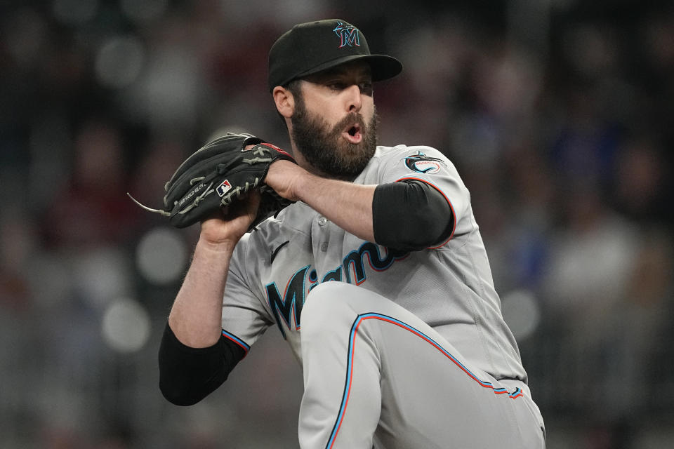 Miami Marlins relief pitcher Dylan Floro works in the eighth inning of the team's baseball game against the Atlanta Braves on Wednesday, April 26, 2023, in Atlanta. (AP Photo/John Bazemore)