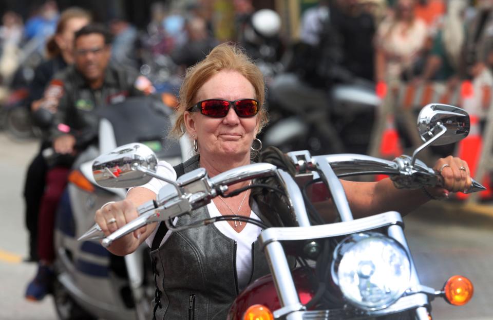 Lady riders cruise Main Street on Monday during Bike Week 2024 in Daytona Beach. "When I'm riding, I go to my happy place," said Stephanie Urrata, 43,  who traveled from Boston with friends for Bike Week.