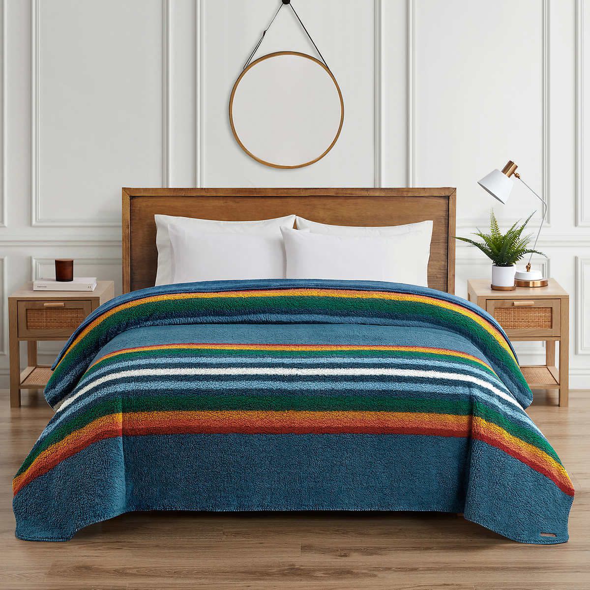 Pendleton's sherpa fleece blanket on a bed