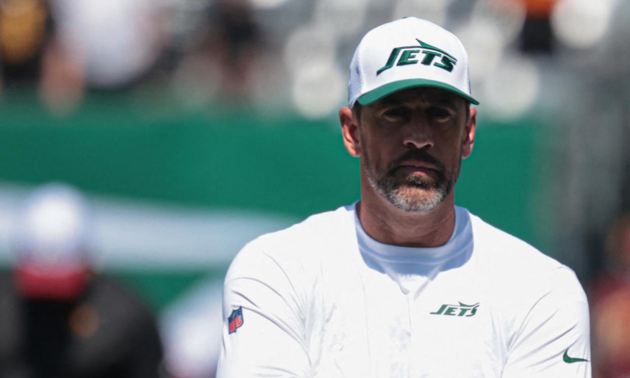 <span>Aaron Rodgers takes in the scene before the New York Jets’ recent preseason game against the Washington Commanders.</span><span>Photograph: Vincent Carchietta/USA Today Sports</span>