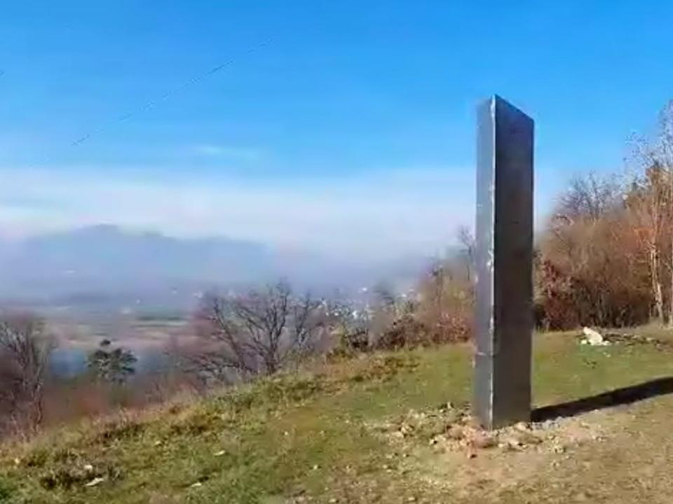 A still from a video from Romanian news outlet Ziar Piatra Neamt showing a monolith discovered on November 27, 2020.