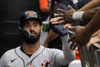 Detroit Tigers' Riley Greene celebrates with teammates after scoring on a one-run double by Javier Baez during the third inning of a baseball game against the Chicago White Sox in Chicago, Sunday, Aug. 14, 2022. (AP Photo/Nam Y. Huh)