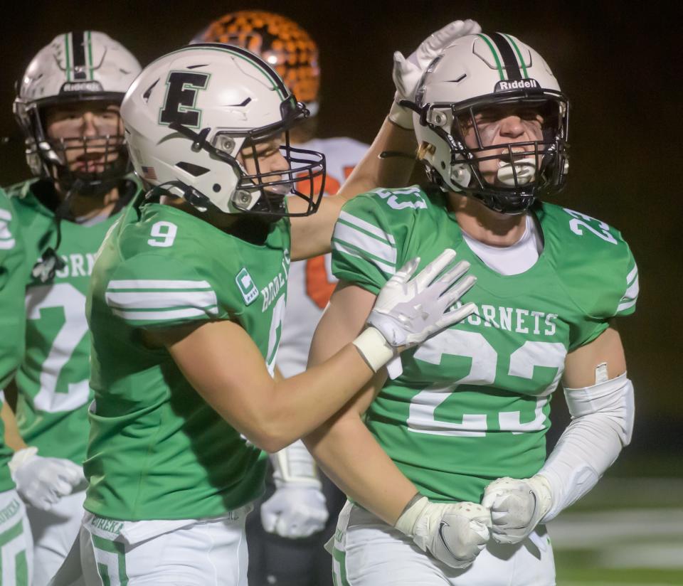 Eureka's Mason Boles (23) gets pumped up after tackling a Beardstown ballcarrier in the second half of their Class 3A first-round playoff game Friday, Oct. 28, 2022 in Eureka. The Hornets advanced with a 49-6 victory.