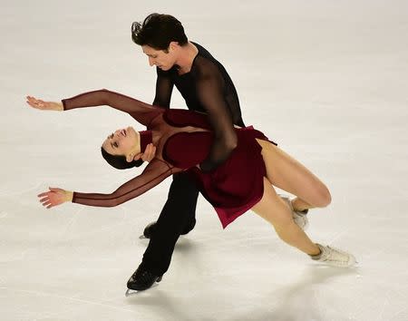 Jan 13, 2018; Vancouver, British Columbia, CAN; Tessa Virtue and Scott Moir skate in the Senior dance free program at Doug Mitchell Thunderbird Sports Centre. Mandatory Credit: Anne-Marie Sorvin-USA TODAY Sports