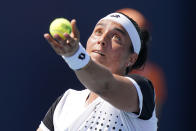 Ons Jabeur of Tunisia serves to Danielle Collins, during the Miami Open tennis tournament, Monday, March 28, 2022, in Miami Gardens, Fla. (AP Photo/Wilfredo Lee)