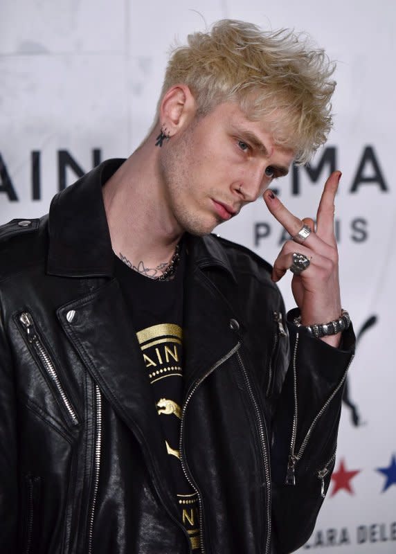 Machine Gun Kelly arrives for the Puma x Balmain x Cara Delevingne launch party at Milk Studios in Los Angeles on November 21, 2019. The musician turns 34 on April 22. File Photo by Chris Chew/UPI