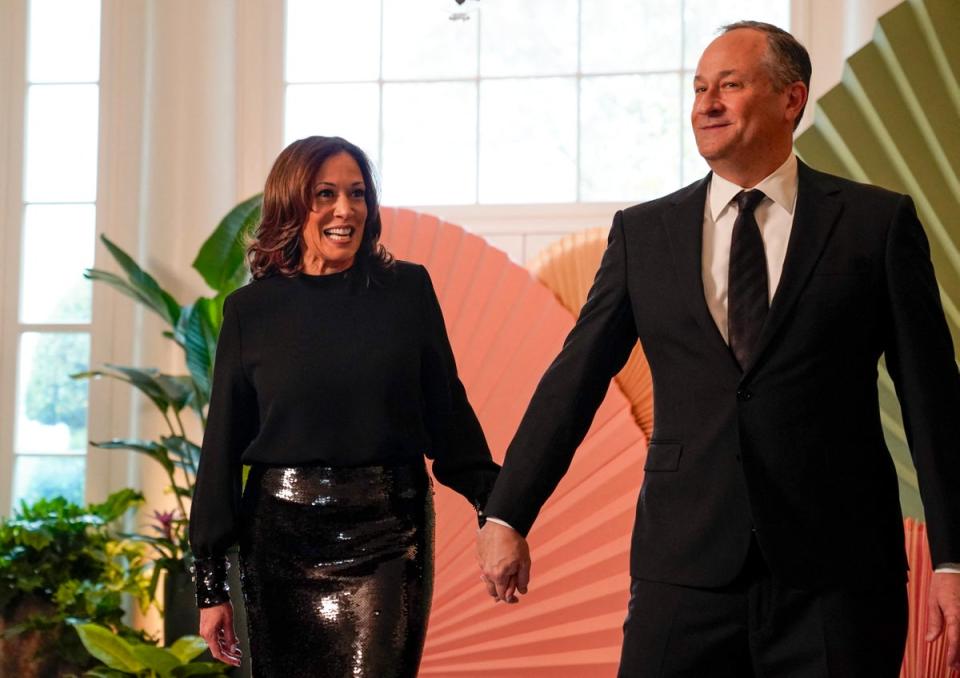 Kamala Harris and second gentleman Doug Hemhoff arrive for a state dinner (AFP via Getty Images)