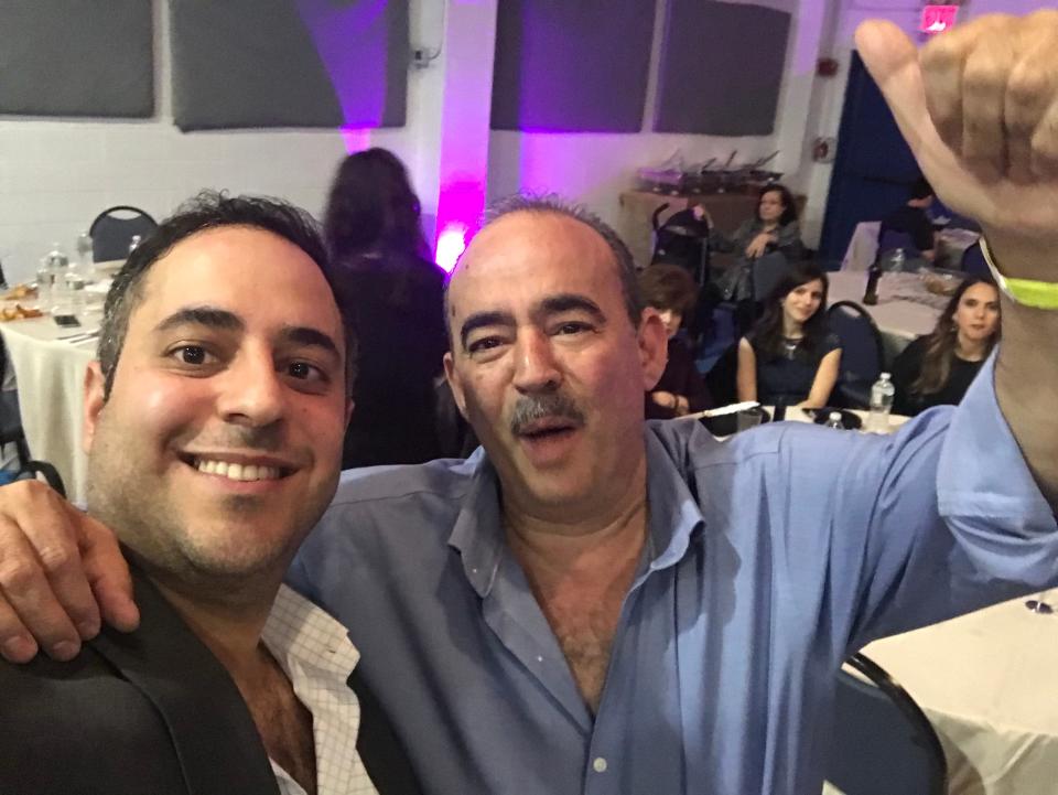 Andreas Koutsoudakis Jr., left, took over his father's Tribeca restaurant after his dad died from COVID-19 in March 2020.