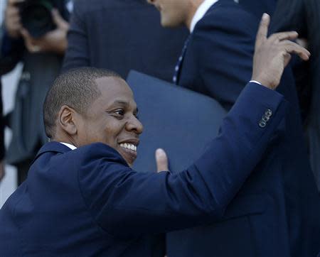 Rapper Jay-Z acknowledges a fan during a news conference after announcing his two-day "Made in America" music festival with Los Angeles Mayor Eric Garcetti, in Los Angeles April 16, 2014. REUTERS/Kevork Djansezian