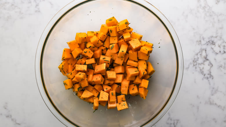 seasoned butternut squash cubes in a bowl