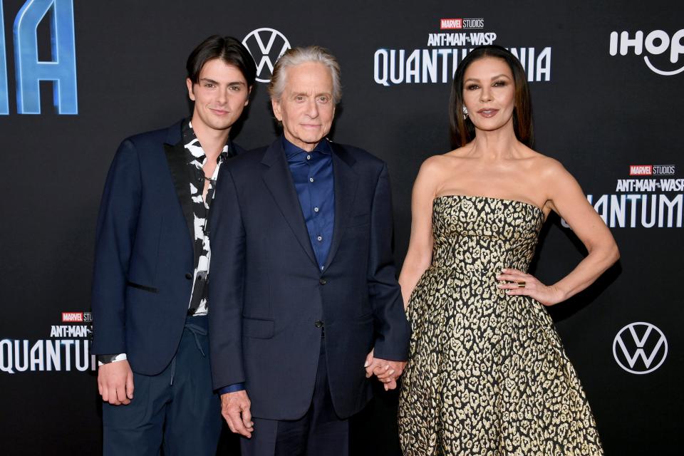 Dylan Michael Douglas, Michael Douglas, and Catherine Zeta-Jones attend Marvel Studios' “Ant-Man And The Wasp: Quantumania" at Regency Village Theatre on February 06, 2023 in Los Angeles, California.