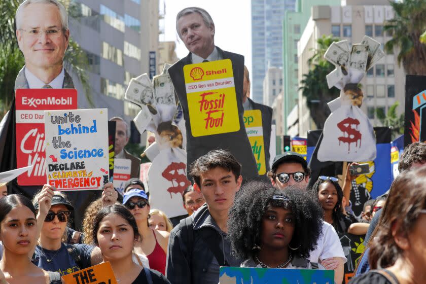 Photographs by Irfan Khan  Los Angeles Times STUDENTS PROTEST inaction on climate change Friday in Pershing Square. Many said they wanted to join a generation of activists trying to build a more sustainable world. Speakers included actress Jane Fonda.