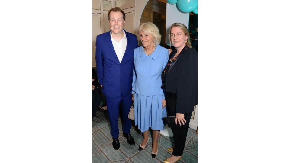 Tom Parker Bowles standing with Queen Camilla and Laura Lopes