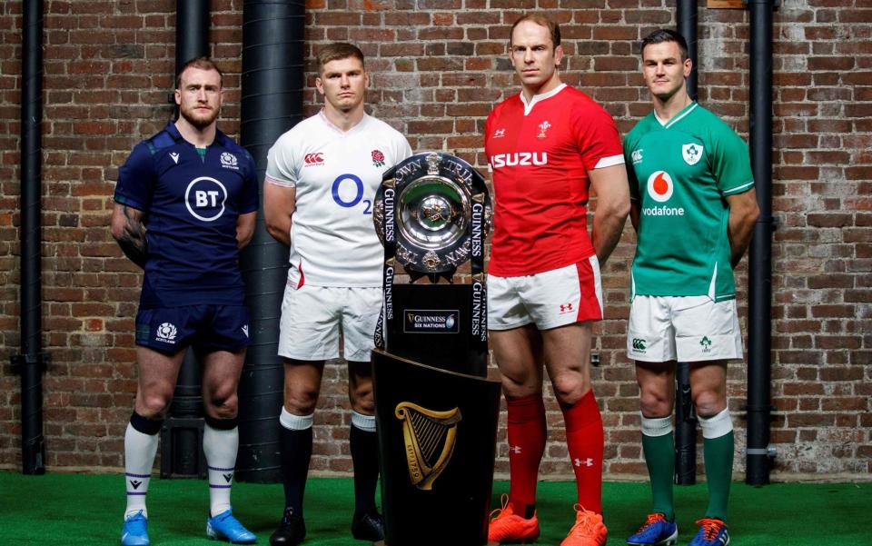 Six nations international rugby captains (L-R) Scotland's captain Stuart Hogg, England's captain Owen Farrell, Wales' captain Alun Wyn Jones, and Ireland's captain Jonathan Sexton pose with the Triple Crown trophy during the 6 Nations Rugby Union launch event in east London - GETTY IMAGES