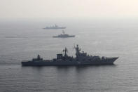 In this photo provided Friday, Jan. 21, 2022, by the Iranian Army, warships attend a joint naval drill of Iran, Russia and China in the Indian Ocean. Iran's state TV said 11 of its vessels were joined by three Russian ships including a destroyer, and two Chinese vessels. Iran's Revolutionary Guard will also participate with smaller ships and helicopters. (Iranian Army via AP)