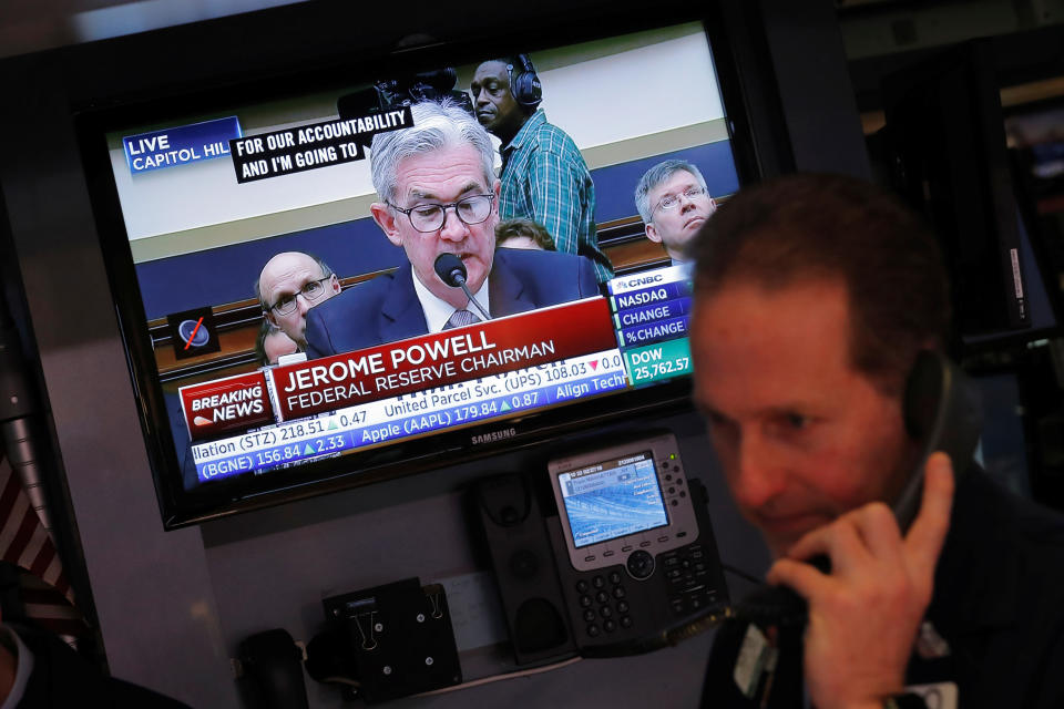 Federal Reserve Chairman Jerome Powell speaks on a television as traders work on the floor of the New York Stock Exchange in New York, U.S., February 27, 2018.  REUTERS/Lucas Jackson