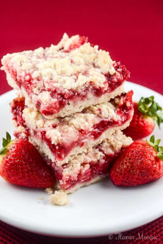 <p>These easy Strawberry Crumb Bars, with a buttery crust, sweet fresh strawberry filling and crunchy butter crumb topping make wonderful dessert bars for an afternoon snack. </p><p>Get the recipe: <a href="https://flavormosaic.com/strawberry-crumb-bars/" rel="nofollow noopener" target="_blank" data-ylk="slk:Strawberry Crumb Bars;elm:context_link;itc:0;sec:content-canvas" class="link "><strong>Strawberry Crumb Bars</strong></a></p>