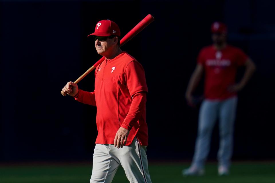 Philadelphia Phillies manager Rob Thomson looks on during practice ahead of Game 1 of the baseball NL Championship Series against the San Diego Padres, Monday, Oct. 17, 2022, in San Diego. The Padres host the Phillies for Game 1 Oct. 18. (AP Photo/Gregory Bull)