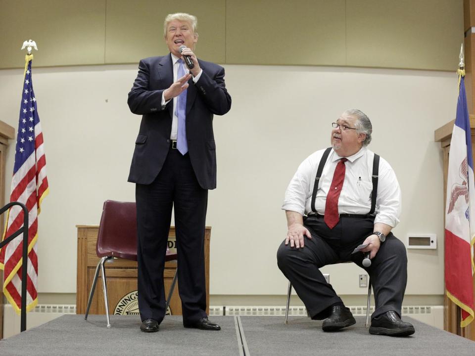 Donald Trump and Sam Clovis addressing a gathering for a non-declared presidential campaign stop in 2015 (ZUMA/REX )