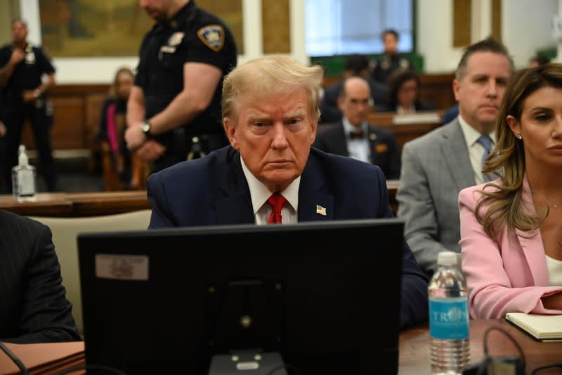 Former President Donald Trump in the courtroom at State Supreme Court on Dec. 7, in New York City. The case brought last September by New York Attorney General Letitia James, accuses Trump, his eldest sons and his family business of inflating Trump's net worth by more than $2 billion by overvaluing his real estate portfolio. Photo by Louis Lanzano/UPI