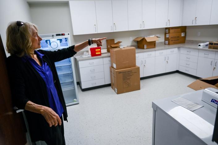 Executive director Joan Nelson talks about the lab inside the Allen Community Health Center at the Allen Neighborhood Center on Thursday, June 9, 2022, in Lansing.