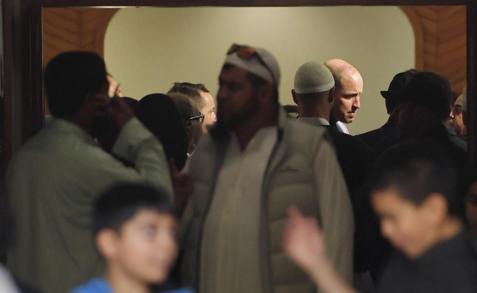 Britain's Prince William, back right, meets members of the Muslim community at the Al Noor mosque in Christchurch, New Zealand, Friday, April 26, 2019. Prince William visited the one of the mosques where 50 people were killed and 50 others wounded in a March 15 attack by a white supremacist. (Tracey Nearmy/Pool Photo via AP)