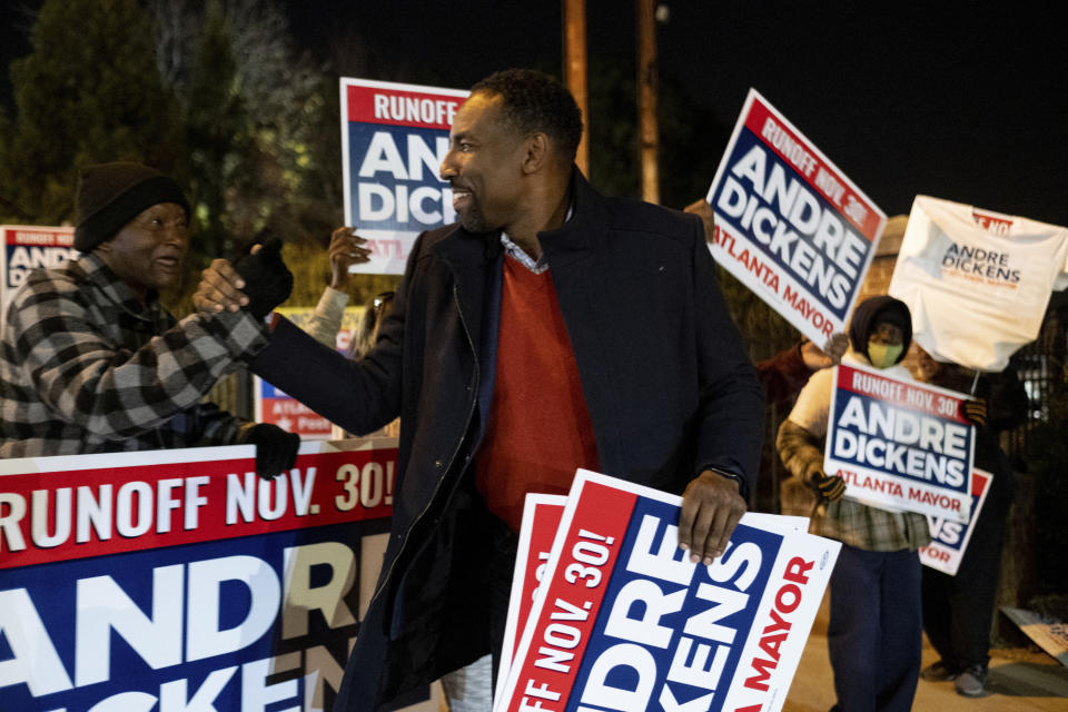 Atlanta mayoral runoff candidate Andre Dickens celebrates with supporters just before the close of polls Tuesday, Nov. 30, 2021, in Atlanta. Dickens, a city council member, won the runoff, riding a surge of support that powered him past the council’s current president, Felicia Moore, after finishing second to her in November. (AP Photo/Ben Gray)