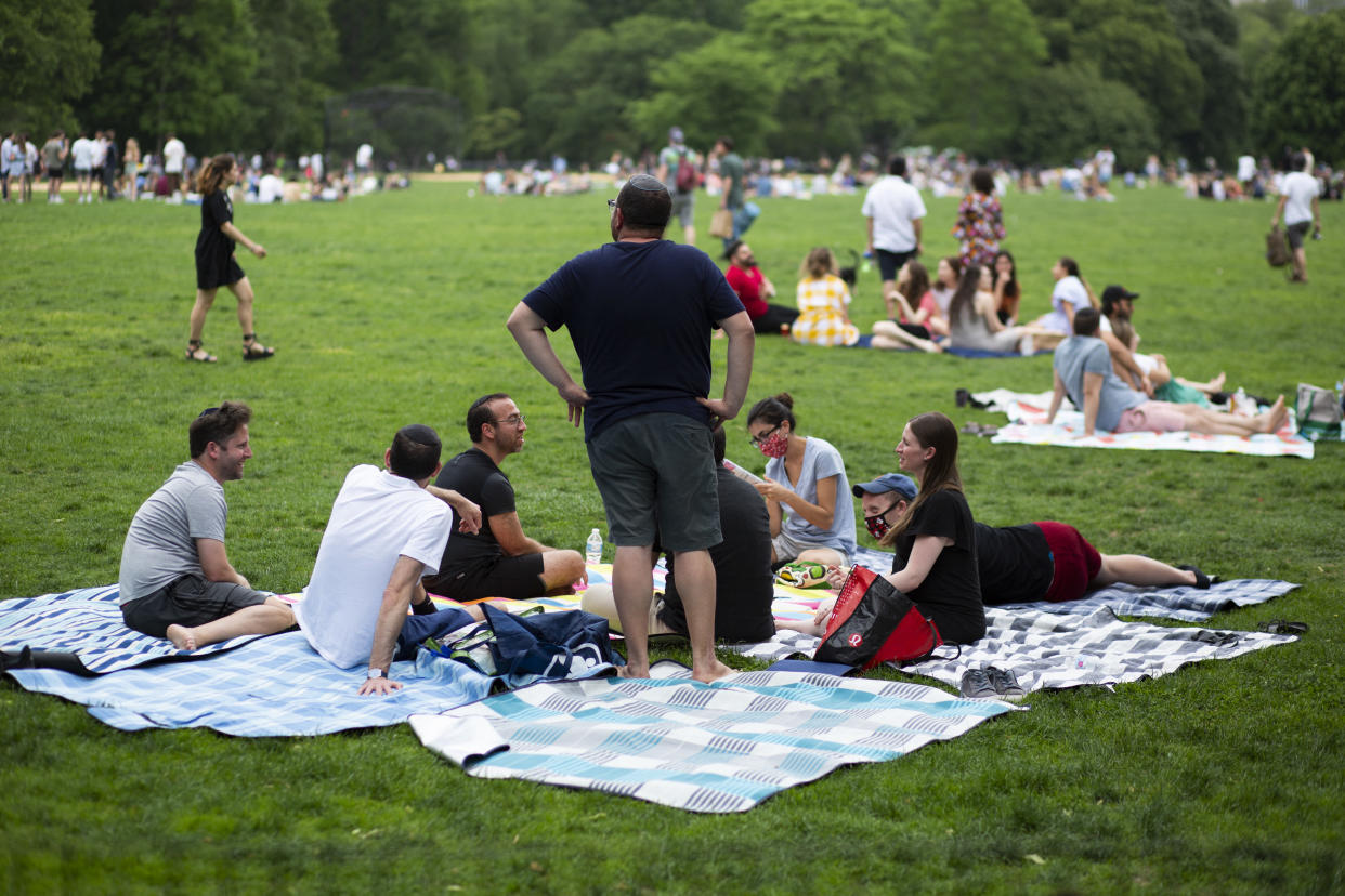 People gather in Central Park in New York last May, after 16 months of restrictions had been lifted. 