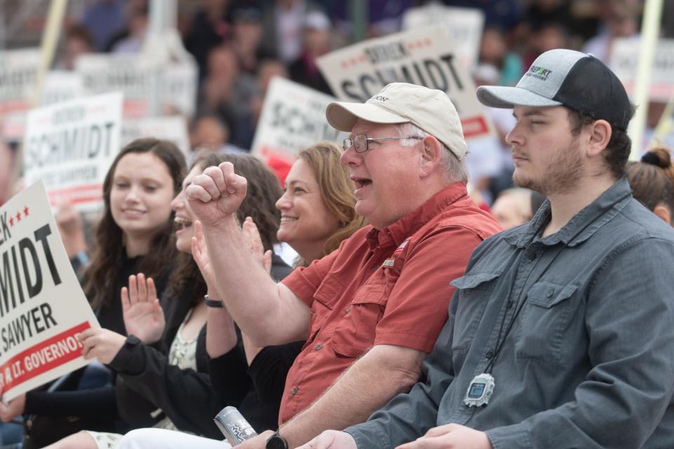 Kansas House Majority Leader Dan Hawkins, R-Wichita, shows support for Attorney General Derek Schmidt for governor during a debate Saturday against Gov. Laura Kelly at the Kansas State Fair in Hutchinson.