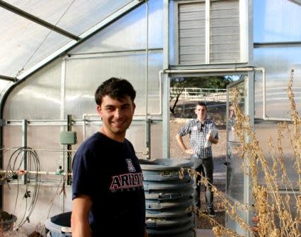 Dragos Zaharescu shows a Biosphere 2 greenhouse to Sean Fleming, one of Carol Schwalbe's science journalism students at the University of Arizona, Tucson, Ariz.