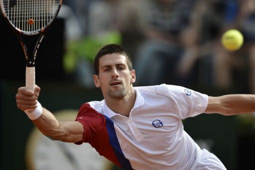 Serbia's Novak Djokovic returns a ball during his quarter-finals match against France's Jo-Wilfried Tsonga at the ATP Rome tournament. Djokovic won 7-5, 6-1