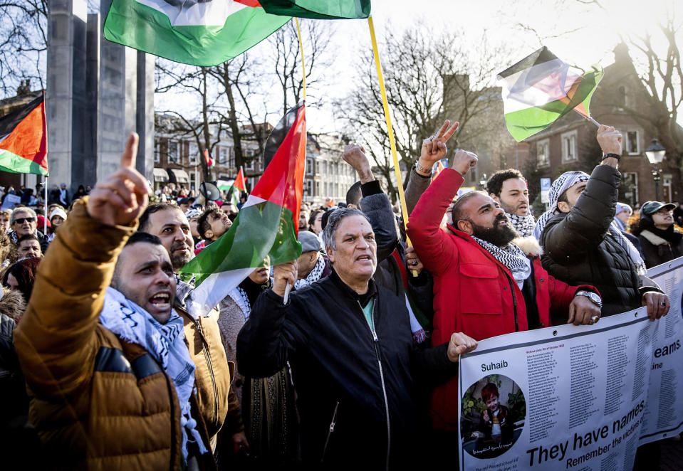 Image: Protesters take part in a demonstration in solidarity with the Palestinian population, as the International Court of Justice (Koen van Weel / AFP - Getty Images)