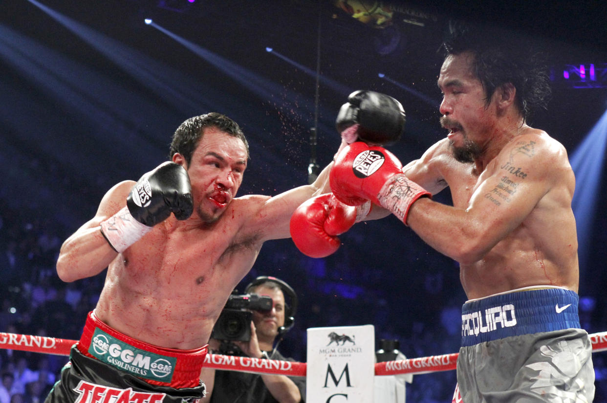 Juan Manuel Márquez peleó un total de cuatro ocasiones contra Manny Pacquiao con saldo de una victoria, un empate y dos derrotas. (REUTERS/Steve Marcus)