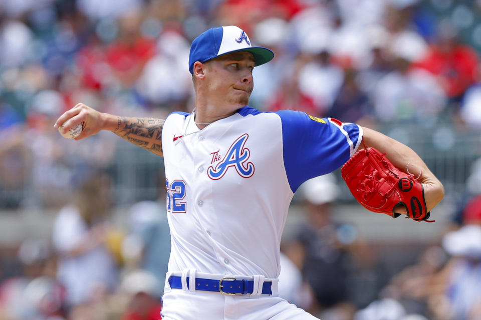 Atlanta Braves starting pitcher AJ Smith-Shawver (62) delivers during the first inning of a baseball game against the Milwaukee Brewers, Sunday, July 30, 2023, in Atlanta. (AP Photo/Todd Kirkland)