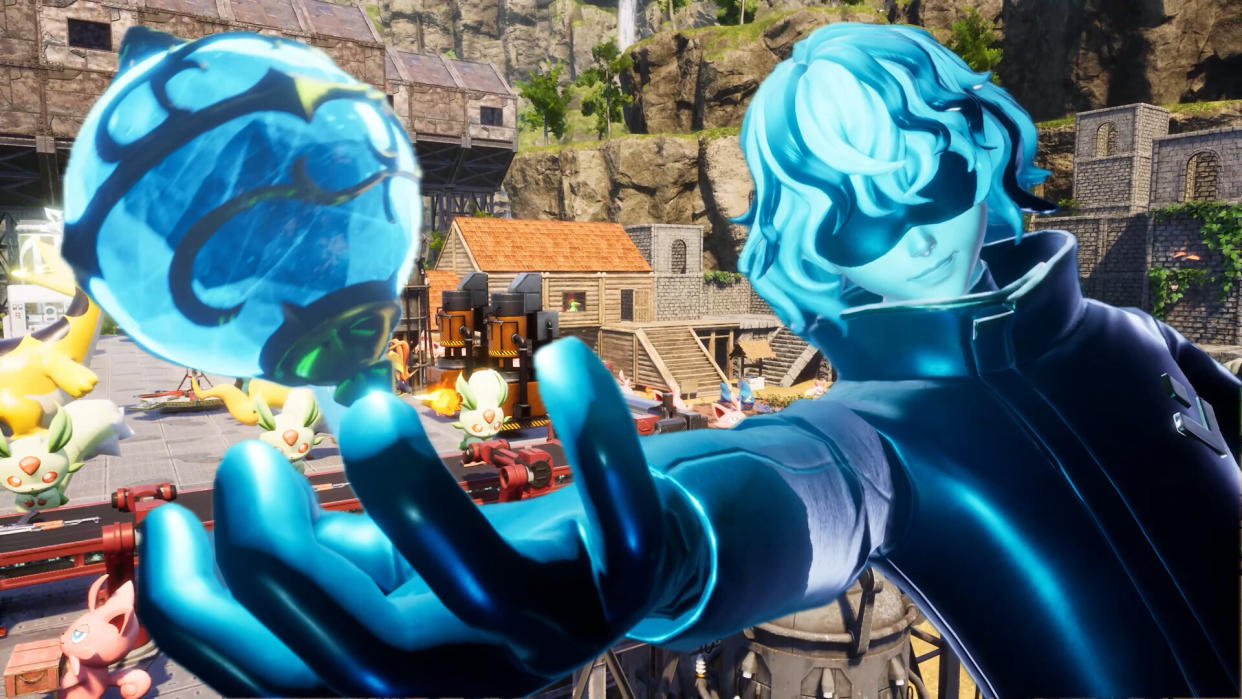  A player holds out a blue Mega Sphere as Pals work away in the background. 