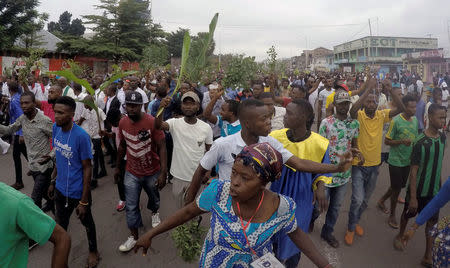 Demonstrators chant slogans during a protest against President Joseph Kabila, organized by the Catholic church in Kinshasa, Democratic Republic of Congo January 21, 2018. REUTERS/Kenny Katombe