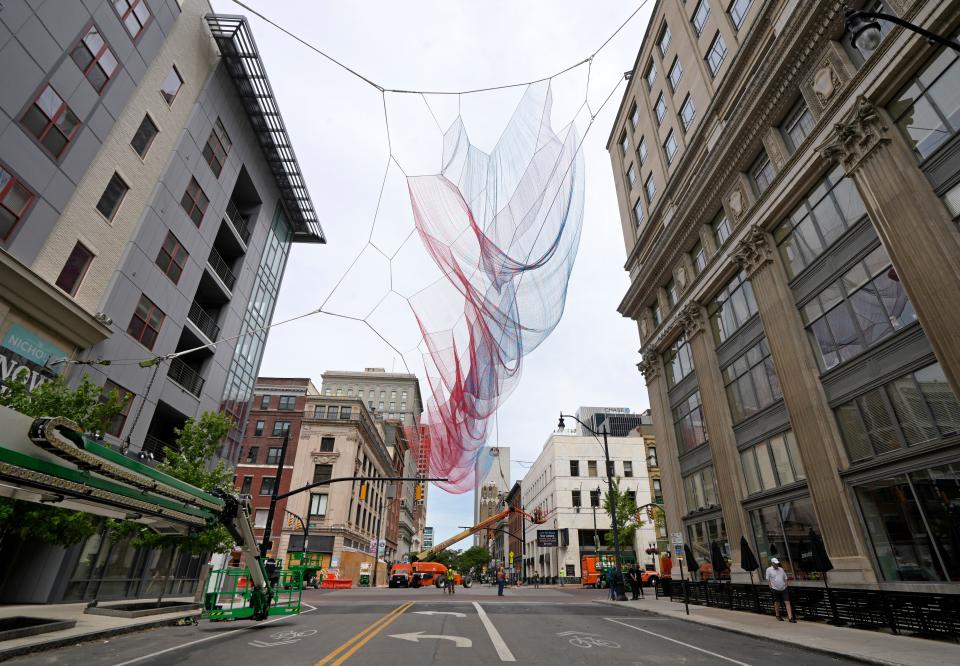 Traffic was blocked Saturday at the intersection of North High and Gay streets in downtown Columbus for the day-long installation of "Current," a nylon sculpture by artist Janet Echelman.