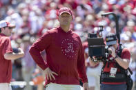 Alabama head coach Kalen DeBoer watches warmups before the NCAA college football team's spring game, Saturday, April 13, 2024, in Tuscaloosa, Ala.