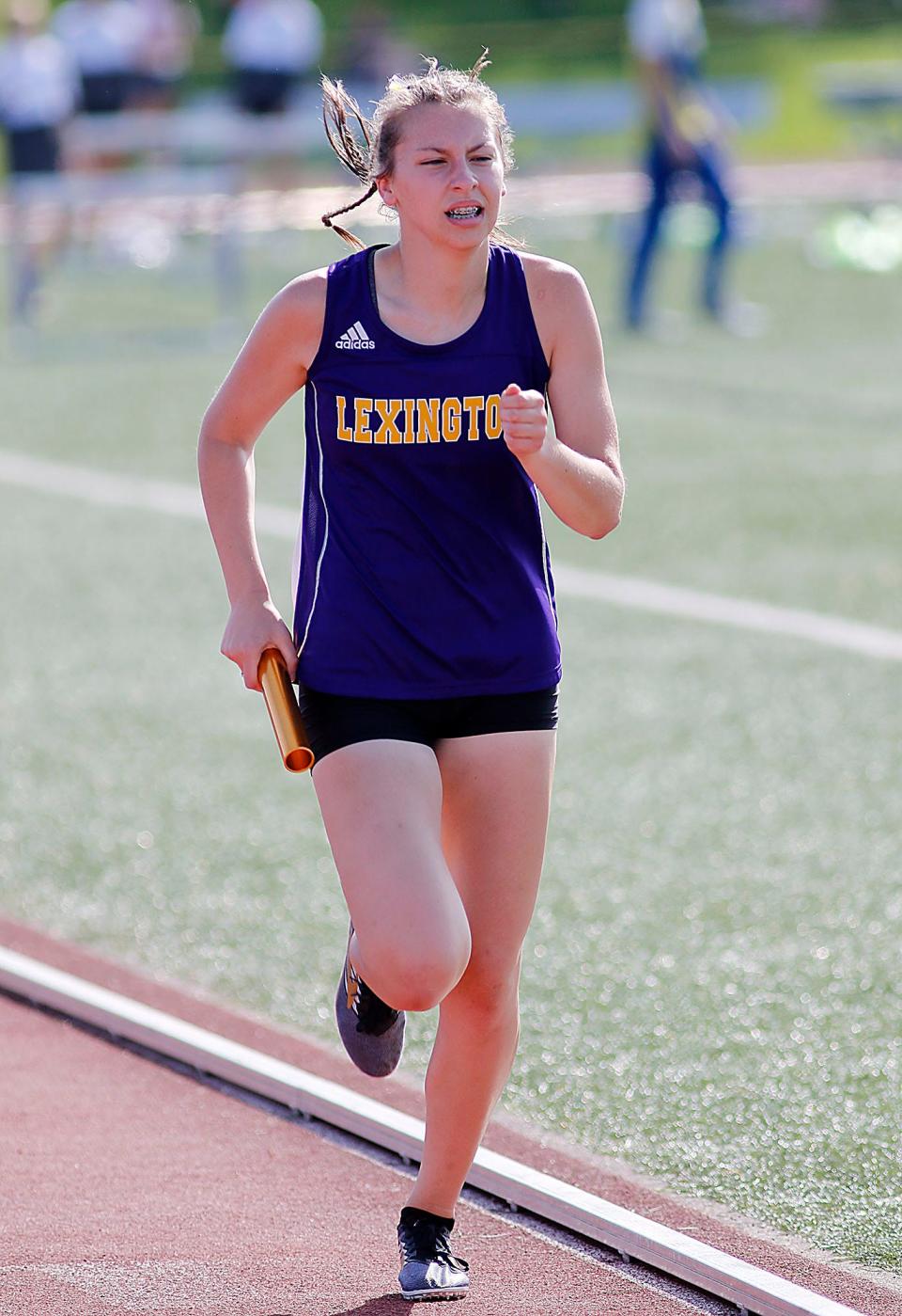 Lexington High School's Natalie Hunter competes in the 4x800 meter relay at the Ohio Cardinal Conference track meet held at Ashland University on Friday, May 13, 2022. TOM E. PUSKAR/TIMES-GAZETTE.COM