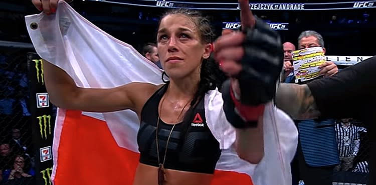 Joanna Jedrzejczyk with Polish flag