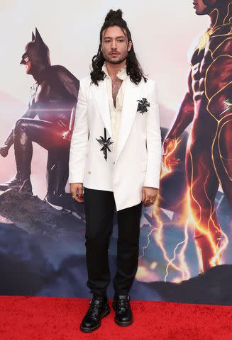 <p>Matt Baron/BEI/Shutterstock</p> Ezra Miller posing at 'The Flash' premiere in L.A.