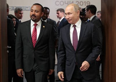 <span class="caption">Abiy Ahmed with Vladimir Putin.</span> <span class="attribution"><span class="source">Sergei Chirikov/POOL/AFP via Getty Images</span></span>