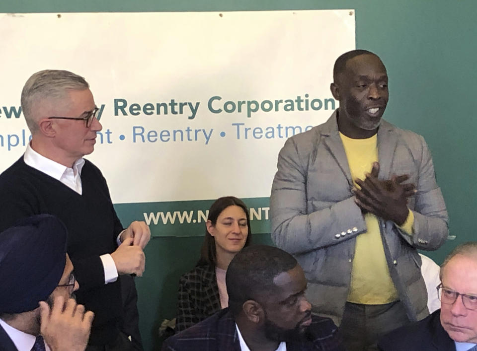 Actor Michael K. Williams, right, speaks at news conference on prisoner re-entry sponsored by New Jersey Re-entry Corporation in Newark, N.J., Friday, Feb. 14, 2020. At left is NJRC chairman and former New Jersey Gov. Jim McGreevey. At lower left is New Jersey Attorney General Gurbir Grewal. (AP Photo/David Porter)