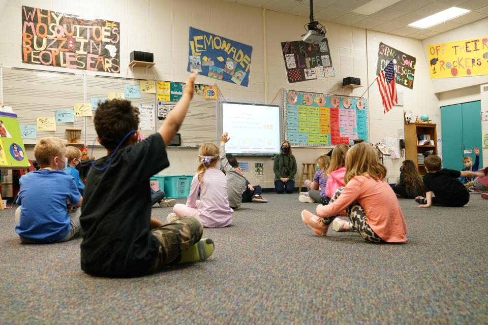 Music teacher Lora Moriarty asks questions to socially distanced students Jan. 27, 2021, at Robert Frost Elementary in the Sioux Falls School District.