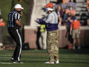 Clemson head coach Dabo Swinney talks to an official during the first half of an NCAA college football game against Pittsburgh Saturday, Nov. 28, 2020, in Clemson, S.C. (Ken Ruinard/Pool Photo via AP)