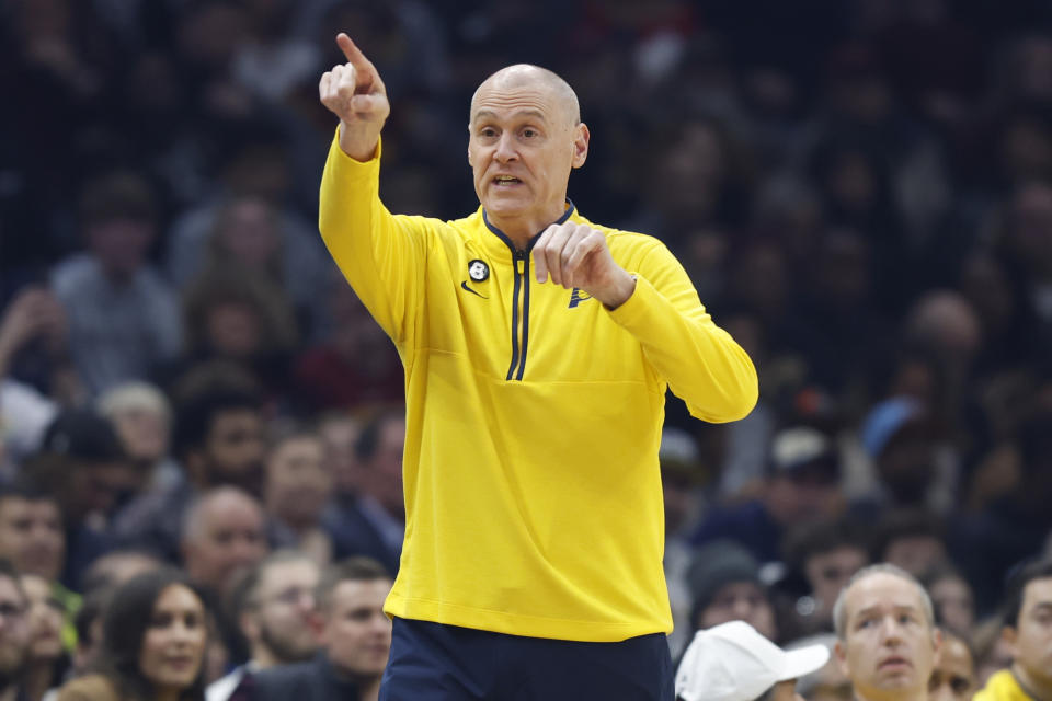 Indiana Pacers head coach Rick Carlisle directs his team during the first half of an NBA basketball game against the Cleveland Cavaliers, Friday, Dec. 16, 2022, in Cleveland. (AP Photo/Ron Schwane)