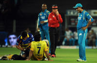 Pune Warriors India captain Sourav Ganguly (R) chats with Chennai Super Kings batsman Mahendra Singh Dhoni during the IPL Twenty20 cricket match between Pune Warriors India and Chennai Super Kings at The Subrata Roy Sahara Stadium in Pune on April 14, 2012. RESTRICTED TO EDITORIAL USE. MOBILE USE WITHIN NEWS PACKAGE AFP PHOTO/Indranil MUKHERJEE (Photo credit should read INDRANIL MUKHERJEE/AFP/Getty Images)