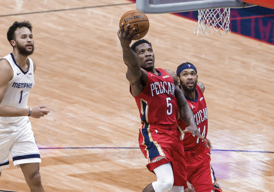 New Orleans Pelicans guard Eric Bledsoe (5) shoots as Memphis Grizzlies forward Kyle Anderson (1) watches during the second quarter of an NBA basketball game in New Orleans, Saturday, Feb. 6, 2021. (AP Photo/Derick Hingle)