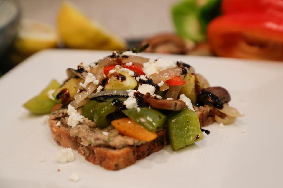 Anna Jones prepared an open-faced roasted vegetable sandwich with two bean hummus to demonstrate a healthy meal to help prevent stroke.