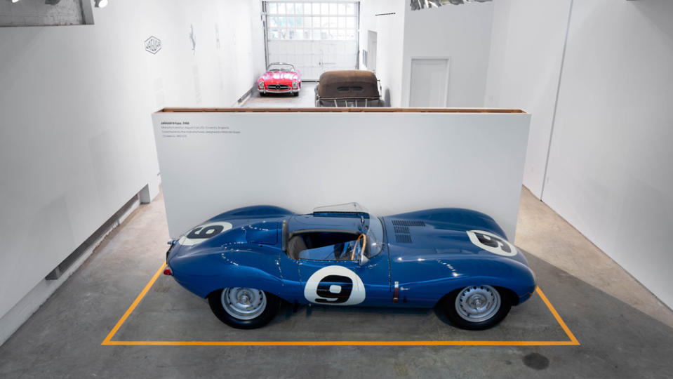 A 1955 Jaguar D-Type, a 1937 Horch 853 Cabriolet and a 1961 Mercedes-Benz 300 SL Roadster comprise part of a temporary display at the Morton Street Partners galley space in Manhattan.